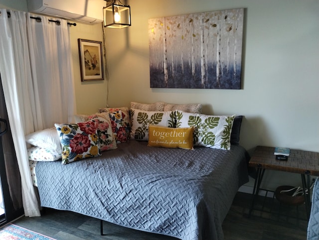 bedroom featuring wood finished floors