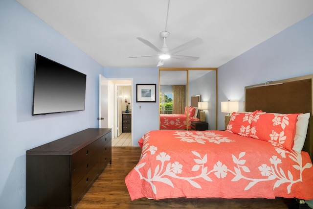 bedroom featuring wood finished floors, a closet, and ceiling fan