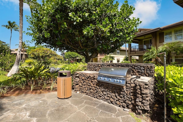 view of patio featuring area for grilling and an outdoor kitchen