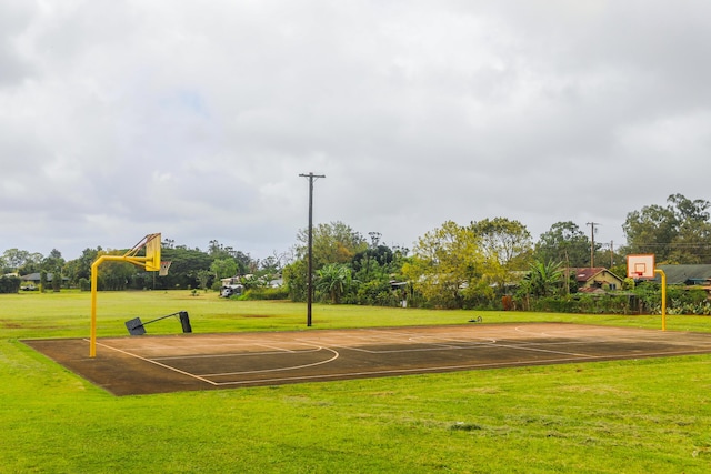 view of sport court with community basketball court and a yard