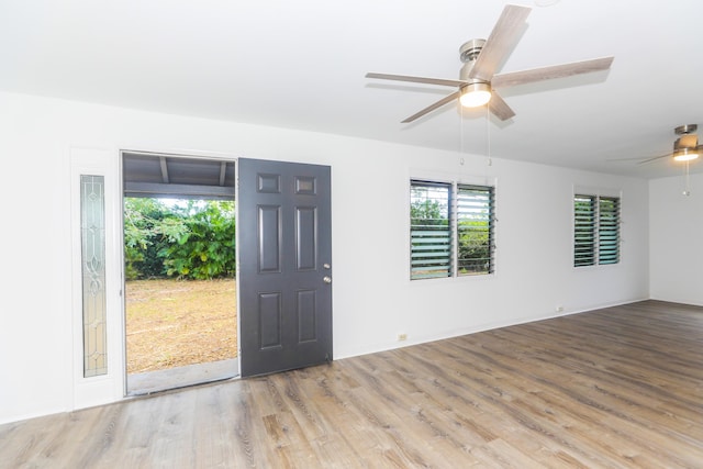 entryway featuring ceiling fan and wood finished floors