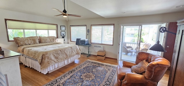 bedroom with a wall mounted air conditioner, access to exterior, ceiling fan, and light wood finished floors