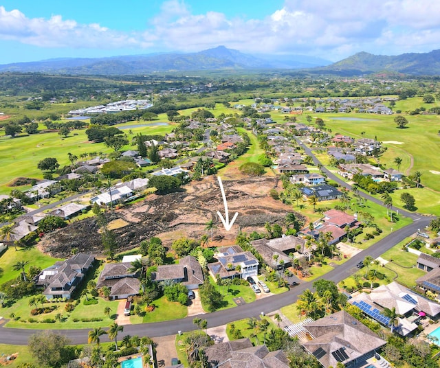 aerial view featuring a mountain view, a residential view, and view of golf course