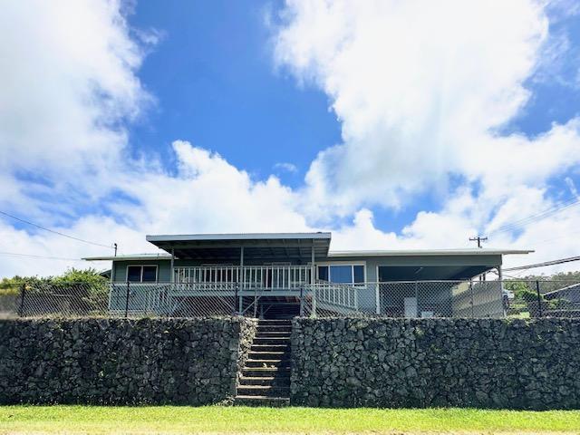 45-571 Pakalana St, Honokaa, HI 96727 - back of house featuring stairs, fence, and a carport