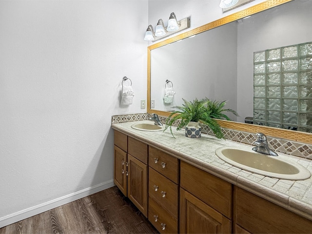 87-2814 Hawaii Belt Rd, Captain Cook, HI 96704 - full bathroom with double vanity, wood finished floors, baseboards, and tasteful backsplash