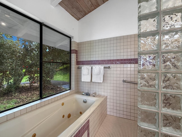 87-2814 Hawaii Belt Rd, Captain Cook, HI 96704 - full bathroom with tile walls, a jetted tub, tile patterned flooring, and lofted ceiling