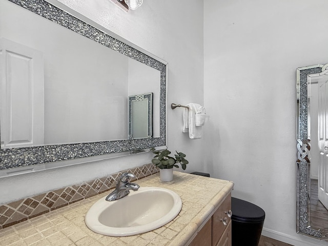 87-2814 Hawaii Belt Rd, Captain Cook, HI 96704 - bathroom with vanity, toilet, and baseboards