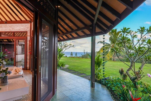 view of patio / terrace with a water view