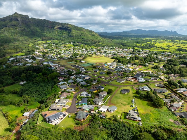 210 Eggerking Rd, Kapaa, HI 96746 - aerial view of property and surrounding area with mountains and nearby suburban area