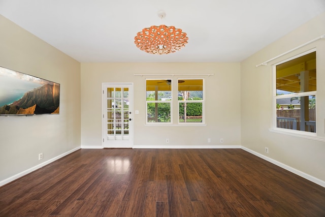 210 Eggerking Rd, Kapaa, HI 96746 - unfurnished room with wood finished floors, baseboards, and ceiling fan