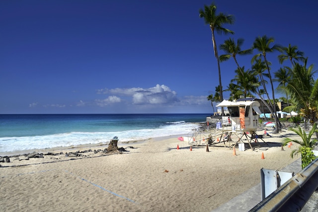 view of water feature with a beach view