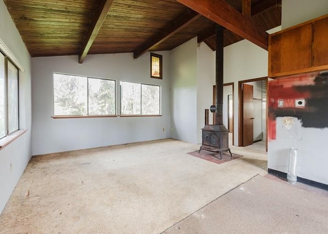 11-3169 Volcano Rd, Volcano, HI 96785 - unfurnished living room with a wood stove, carpet flooring, wooden ceiling, high vaulted ceiling, and beamed ceiling