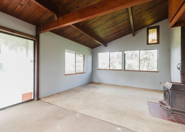 11-3169 Volcano Rd, Volcano, HI 96785 - living area with lofted ceiling with beams, wooden ceiling, and a wood stove