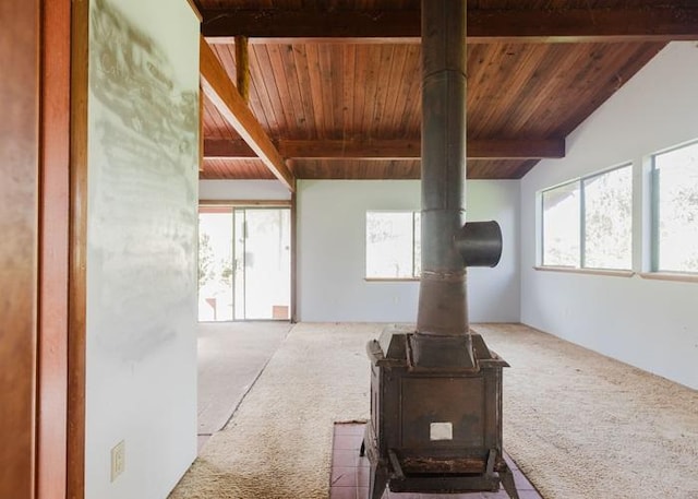 11-3169 Volcano Rd, Volcano, HI 96785 - living room with vaulted ceiling with beams, a wood stove, and wood ceiling