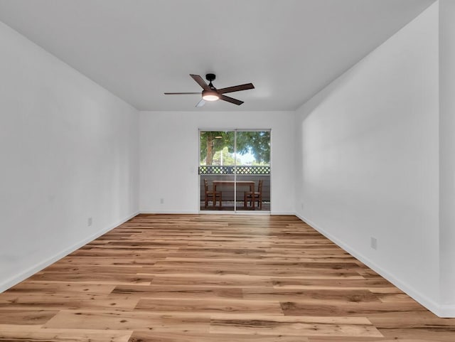 68-3831 Lua Kula St Unit C107, Waikoloa, HI 96738 - empty room featuring light wood-style floors, ceiling fan, and baseboards