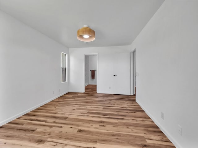68-3831 Lua Kula St Unit C107, Waikoloa, HI 96738 - empty room with light wood-type flooring and baseboards