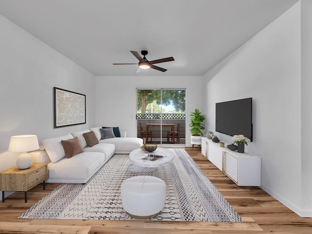 68-3831 Lua Kula St Unit C107, Waikoloa, HI 96738 - living area featuring ceiling fan, wood finished floors, and baseboards