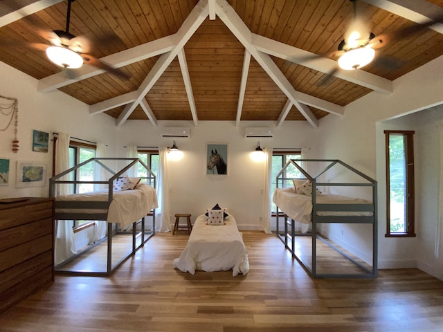 4631 Kahiliholo Rd, Kilauea, HI 96754 - bedroom featuring multiple windows, beam ceiling, and wood finished floors