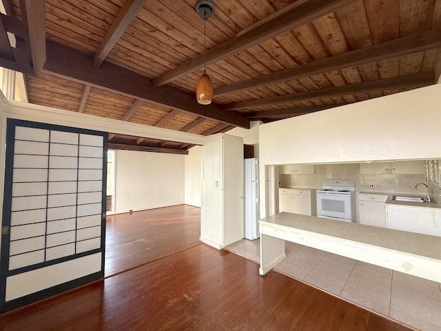 3172 Uluhui St, Lihue, HI 96766 - spare room featuring a sink, wood ceiling, and dark wood-type flooring
