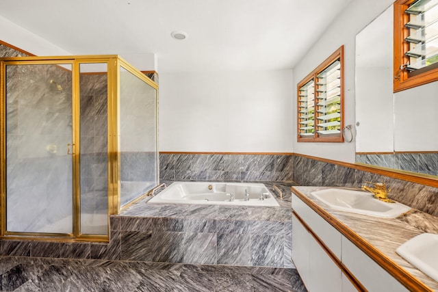 5611 Ohelo Rd, Kapaa, HI 96746 - bathroom with marble finish floor, a bath, a stall shower, and a sink