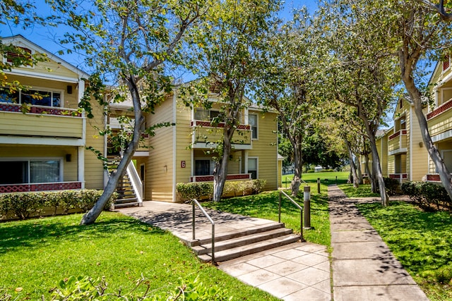 68-3831 Lua Kula St Unit G207, Waikoloa, HI 96738 - view of community featuring stairs and a lawn