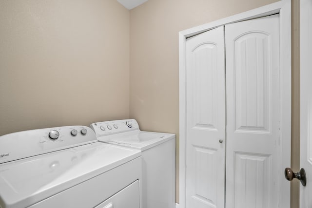 laundry area with washer and dryer and laundry area