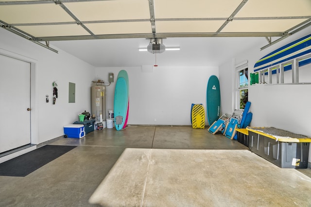 garage with water heater, electric panel, and a garage door opener