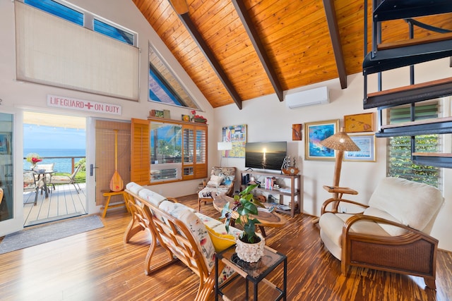 living area with beamed ceiling, wooden ceiling, an AC wall unit, wood finished floors, and high vaulted ceiling