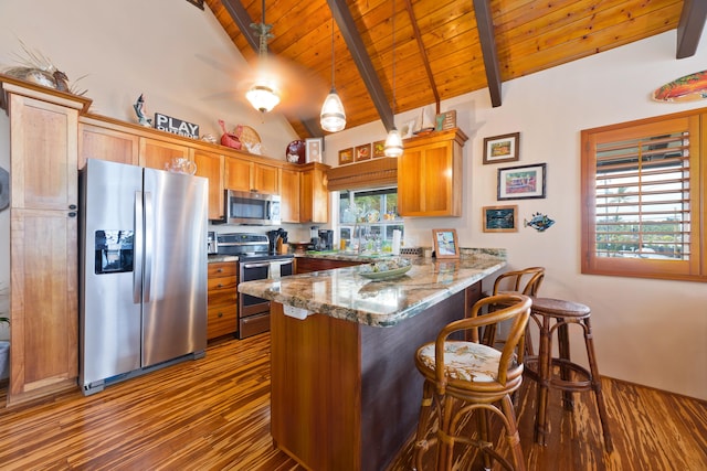 kitchen with wood ceiling, appliances with stainless steel finishes, dark wood finished floors, a peninsula, and vaulted ceiling with beams