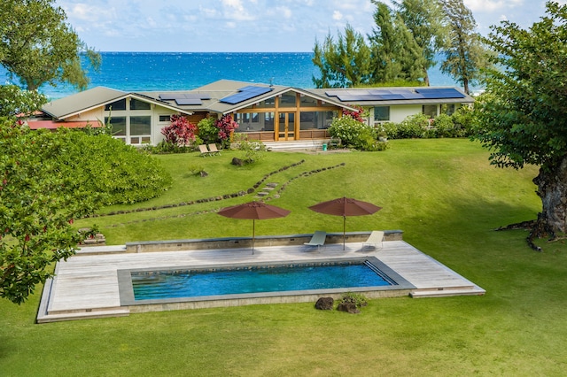 5-8192 Kuhio Hwy, Hanalei, HI 96714 - outdoor pool featuring a sunroom and a lawn
