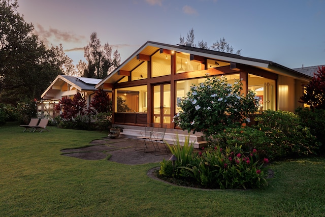 5-8192 Kuhio Hwy, Hanalei, HI 96714 - back of house with a yard and a patio
