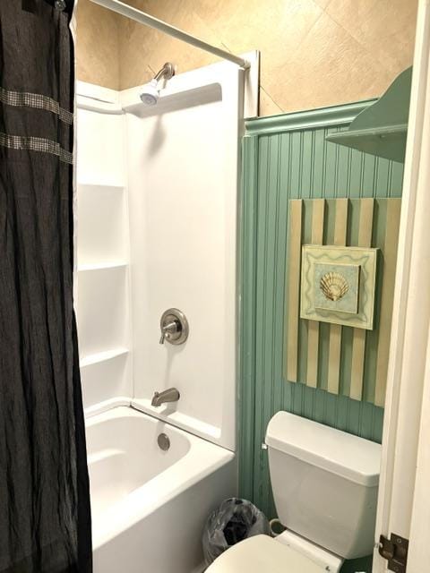 3880 Wyllie Rd Unit 8C, Princeville, HI 96722 - bathroom featuring shower / bath combo with shower curtain and toilet