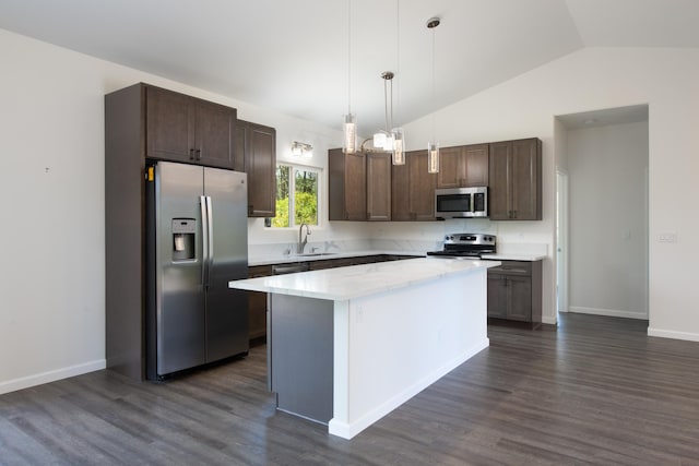 kitchen with stainless steel appliances, a kitchen island, vaulted ceiling, dark brown cabinets, and dark wood-style floors