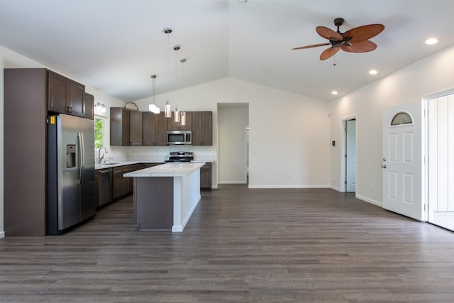 kitchen with stainless steel appliances, light countertops, dark brown cabinets, ceiling fan, and open floor plan
