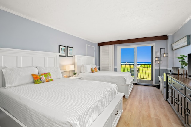 4331 Kauai Beach Dr Unit 4113, Lihue, HI 96766 - bedroom featuring light wood-type flooring, crown molding, and access to outside