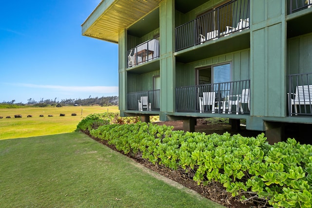 4331 Kauai Beach Dr Unit 4113, Lihue, HI 96766 - exterior space with board and batten siding and a yard