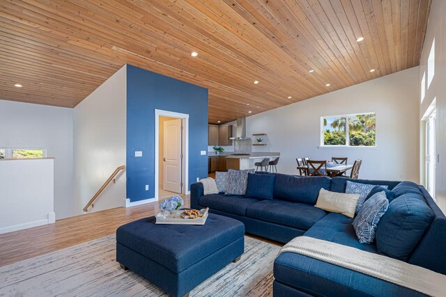 living room with wooden ceiling, wood finished floors, plenty of natural light, and recessed lighting