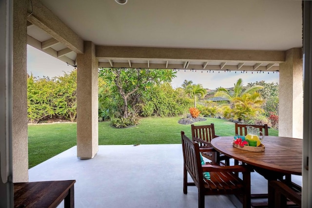 view of patio featuring outdoor dining area