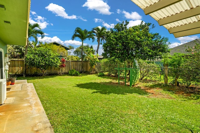 view of yard with a fenced backyard and a patio area