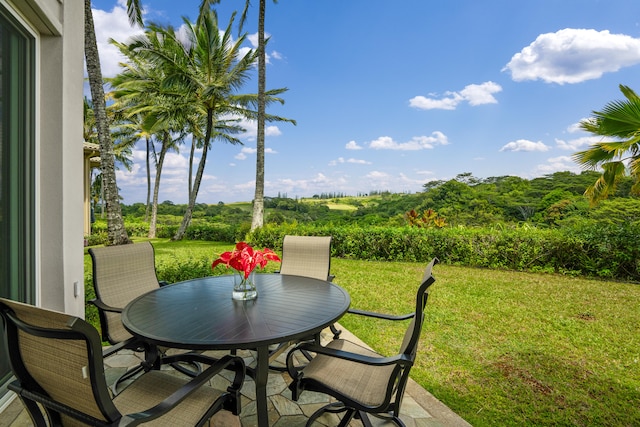 view of patio with outdoor dining area