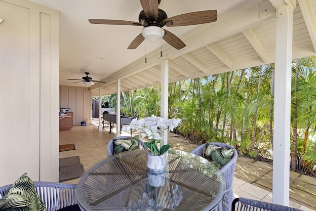 view of patio / terrace with outdoor dining space and a ceiling fan