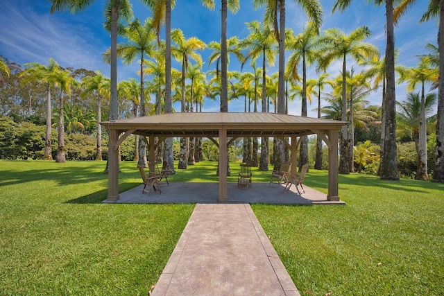 view of community featuring a lawn and a gazebo