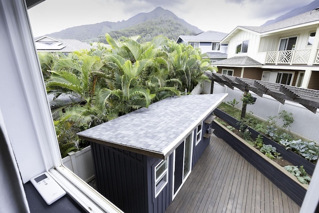 balcony featuring a mountain view