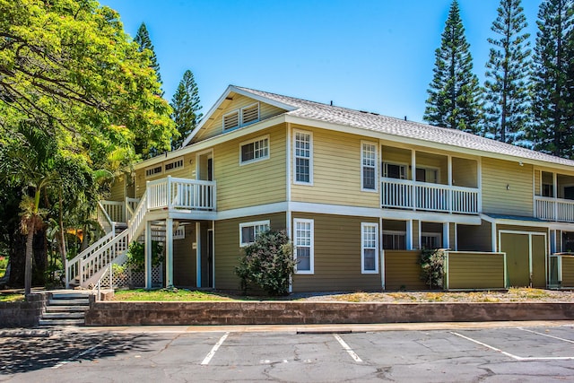 68-3890 Lua Kula St Unit 1601, Waikoloa, HI 96738 - view of property with uncovered parking and stairs
