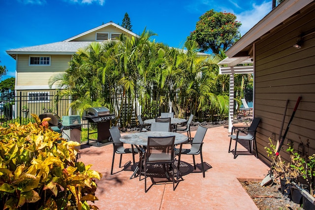 68-3890 Lua Kula St Unit 1601, Waikoloa, HI 96738 - view of patio with fence, outdoor dining space, and area for grilling