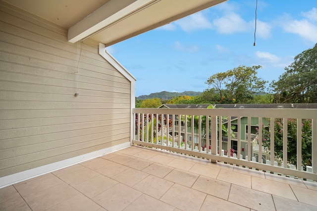 balcony featuring a mountain view
