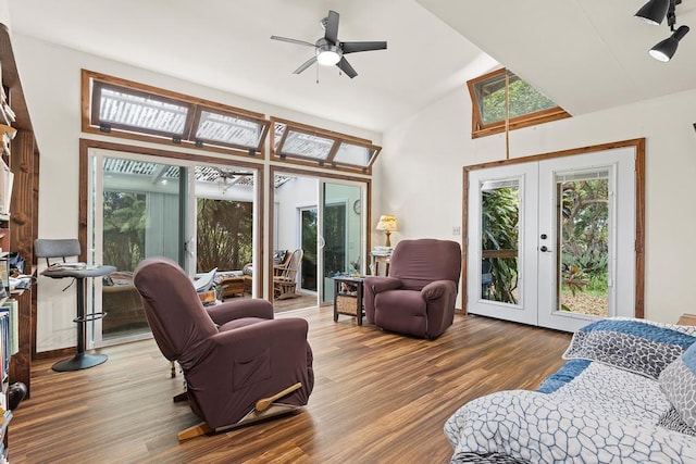 32-520 Piha Kahuku Rd, Ninole, HI 96773 - living area with french doors, wood finished floors, ceiling fan, and high vaulted ceiling