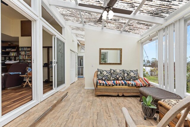 32-520 Piha Kahuku Rd, Ninole, HI 96773 - sunroom with wood-type flooring and baseboards