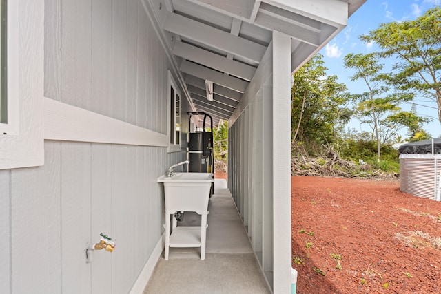 view of side of home with water heater