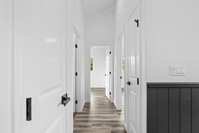 hallway with dark wood-style floors